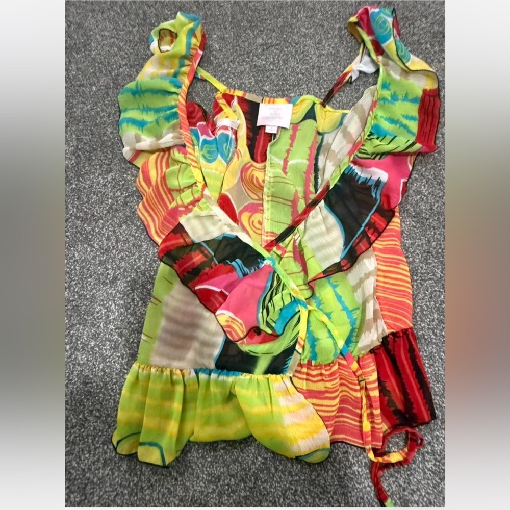 Multi-coloured tie-dye ruffle tie front top with a boho vibe